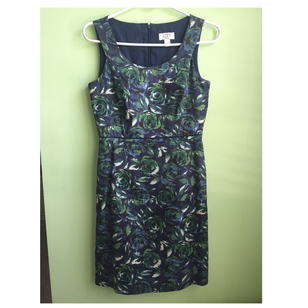 a green and blue floral dress